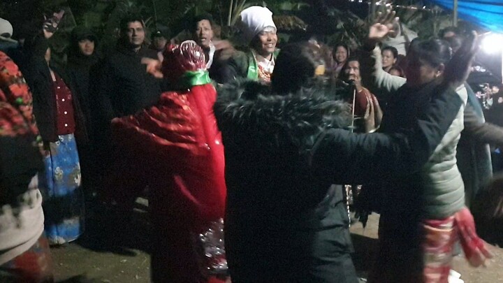 bride and groom dancing with family members | dance in Naumati baja |