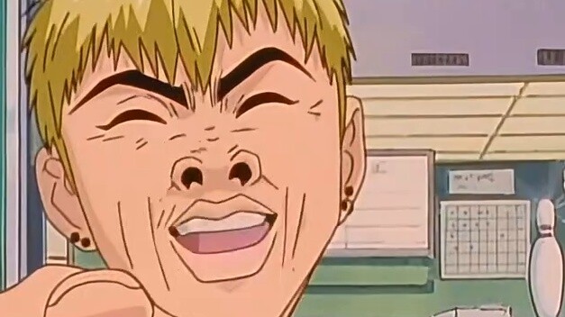 The male protagonist punches a little Karami