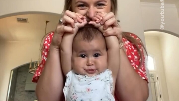 Baby's arm length ≤ head size