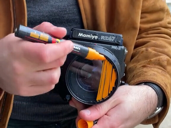 ถ้าใช้ปากกาเมจิกทาทั่วหน้ากล้อง จะถ่ายภาพออกมาเป็นแบบไหนนะ?