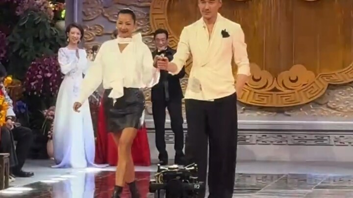 Ye Tong and Tony Leung Ka-fai strut the runway together, their presence easily holding its own again