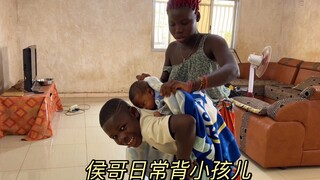 The warm-hearted Hou Ge takes care of the baby every day, and hums a little song happily while carry