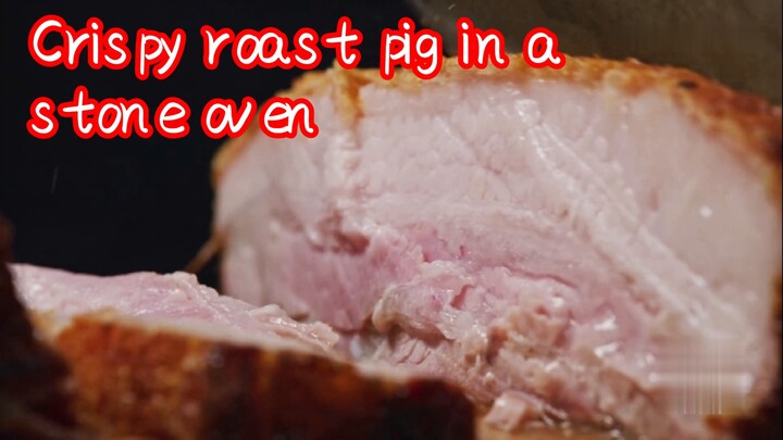 Crispy roast pig in a stone oven