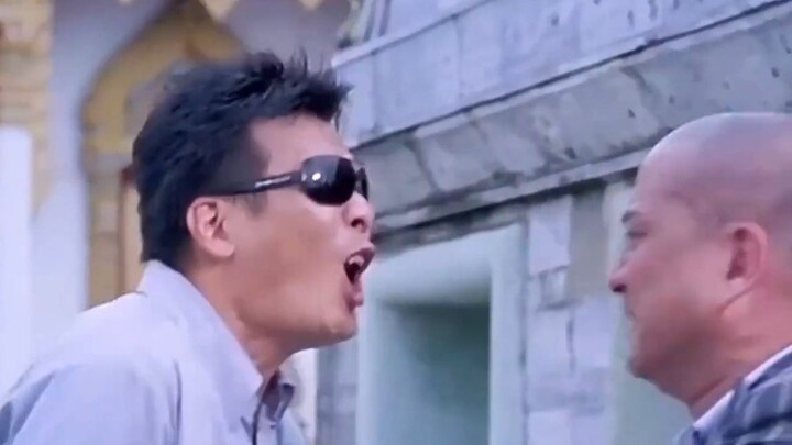 “Why are you stepping on his fingers? A cop doesn’t need to explain themselves to you!” Andy Lau’s “