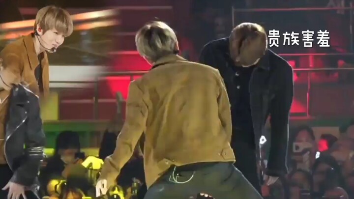 Wu Shixun dan Byun Baekhyun saling berhadapan
