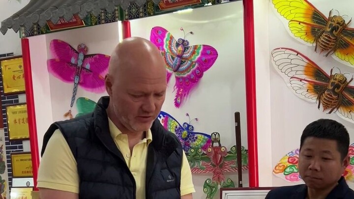 Dad's bargaining skills are getting better and better, but his kite flying skills are...