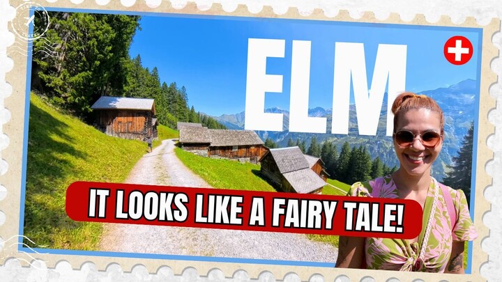 A charming alpine village surrounded by breathtaking mountains, green valleys, and peaceful Swiss la