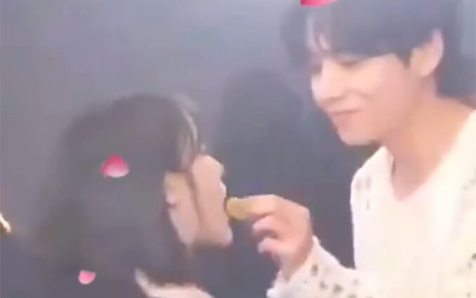 Kim Taehyung feeds grapes to IU
