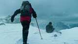 Hiker Finds a Stranded Man Wearing Shorts at The Top of a Snowy Mountain