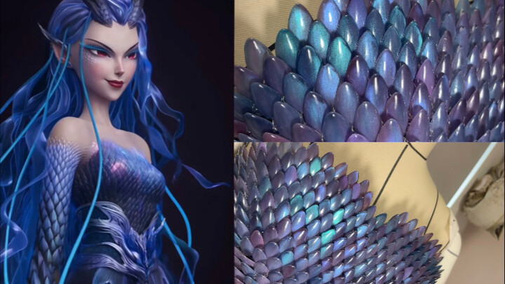 Baju bibi yang terbuat dari hampir seribu lembar kuku palsu..