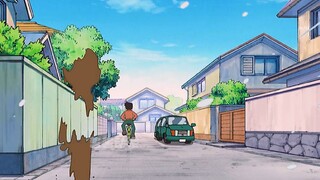 Nobita uses the time machine to go back to the past and change Shizuka's bad birthday.