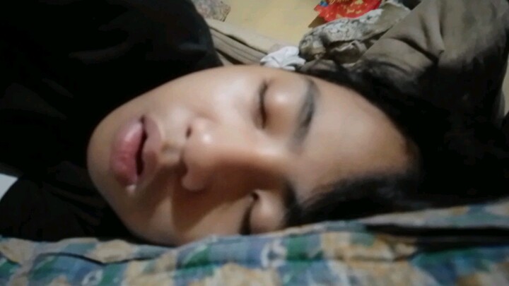 the moymoy is sleeping on my bed