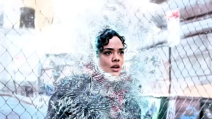 The girl tentatively touched the wire-mesh grid, and her hand passed through the barrier as if she w