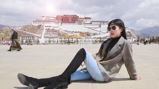 Photographer dancing at Potala Palace