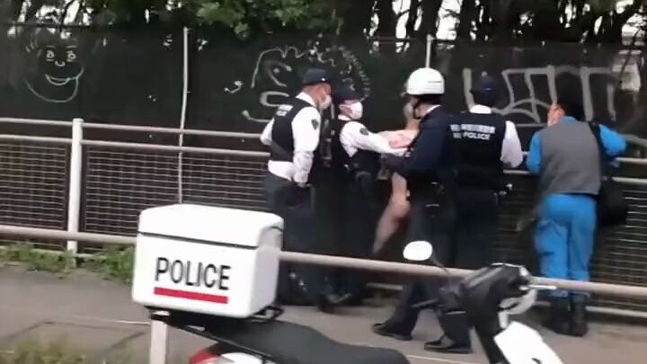 Japanese netizens captured the moment a naked, bald man was arrested by police.