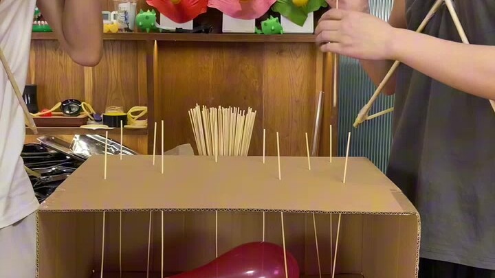 Hurry up and call your friends to watch the balloon-popping challenge!