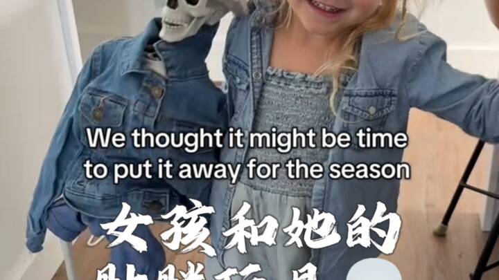 The girl and her skeleton toy!