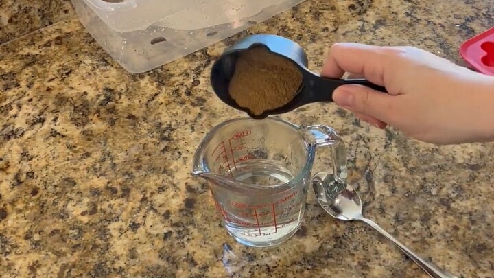 The "bumping" phenomenon that easily occurs when heating purified water in a microwave.