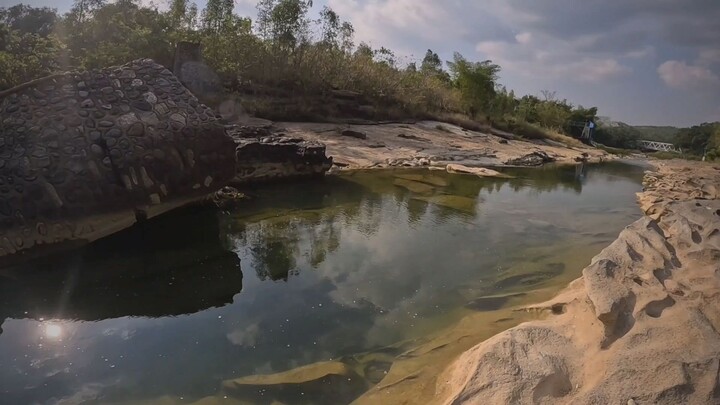 Diving in clear rivers looking for fish