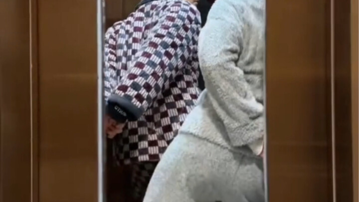 What are the Gao brothers doing in the elevator?