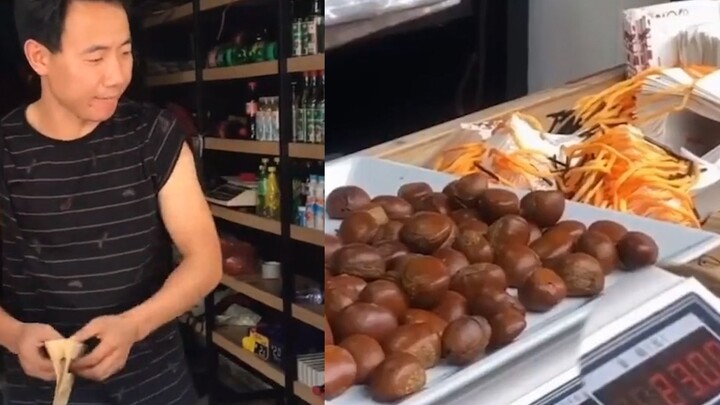 A man selling chestnuts weighed them by hand, and gave away one for free if he got it wrong. Netizen