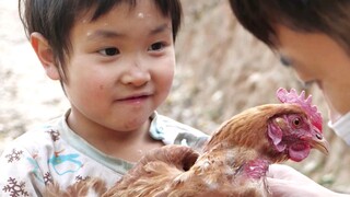 The little girl played with the chicken all day! Her father fell ill and her brothers went to school