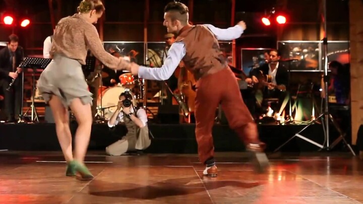 One of my favorite videos when I first learned to swing, the music and the body dance steps are so t