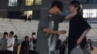 Two guys dancing a duet—so cute!