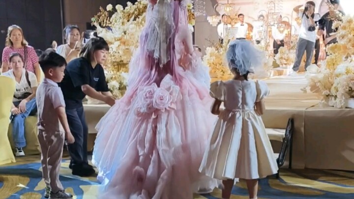 My classmate asked me to wear my most expensive outfit and deliver the wedding rings at his wedding.
