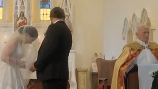 At the wedding, the priest forgot to announce the kiss...