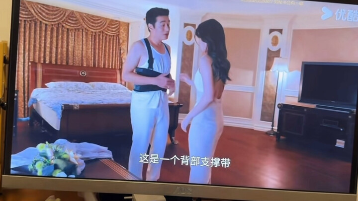 The CEO unbuttons his shirt, revealing the waist and knee braces he’s wearing underneath!