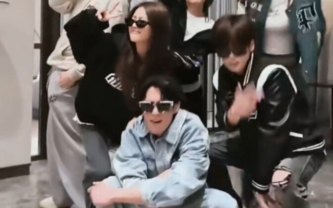 Wang Hedi dances with the cast of Camp Love