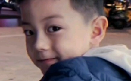 That cool, charming vibe was there from day one—this baby even smiled a “bad-boy” smile right after 