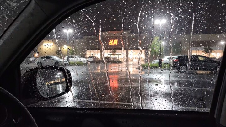 Rainy Night from Inside a Car — Rain Streaks, Bright Shop Lights & Glowing Refle