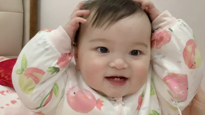 She’s so busy—busy being cute all day long! Just put her on the bed and she’ll be entertained for ho