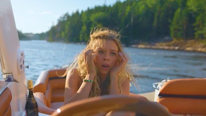 Girl Coaxes Husband to Jump into a Shark-Infested Sea — A Humanity-Themed Film
