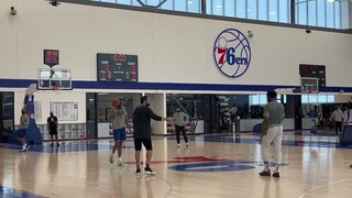 Andre Drummond and Joel Embiid sink half-court shots.