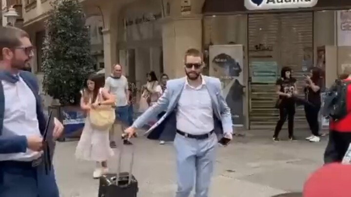 Performance Art: The Motionless Suit-Wearing Man