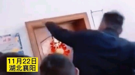 The wedding procession violently kicks down the door, while an elderly person silently stands in fro