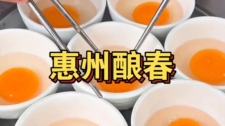 Street-style specialty spring rolls—there’s actually so much stuff stuffed inside the egg yolk, it’s