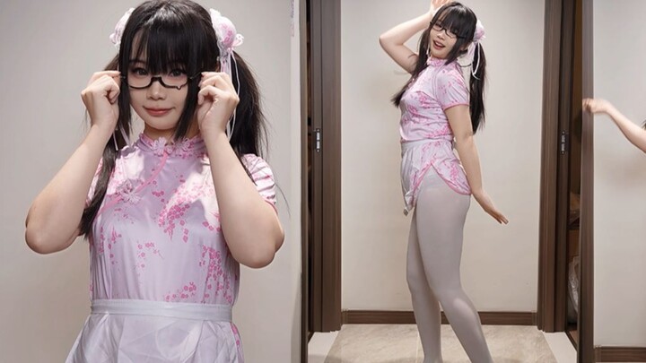 สาวใส่กี่เพ้า แว่นตา ผมหางม้าคู่ ขาเรียบเนียน ในเพลง “ต้าซี”