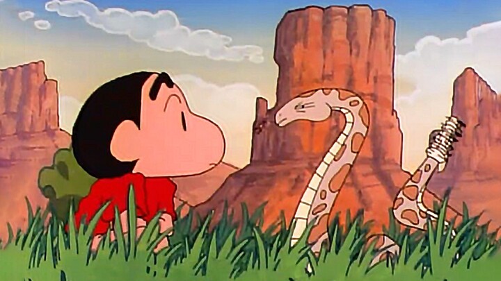 "The rattlesnake's tail is slightly raised, shaped like a whistle."