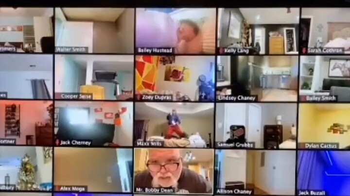 Students prank during a foreign language class; the third student from the right has a delay.