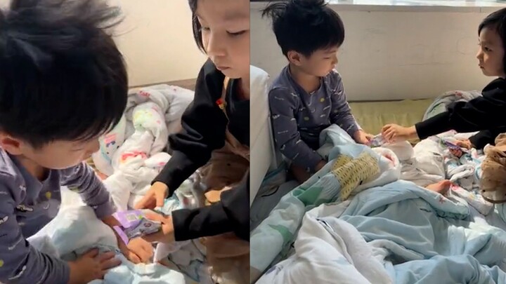The boy was woken up by his female classmate while sleeping. He was wearing diapers and looked embar