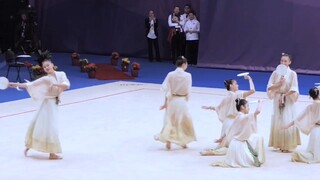 This is a Chinese dance performed by Chinese rhythmic gymnasts. It is really beautiful and the class