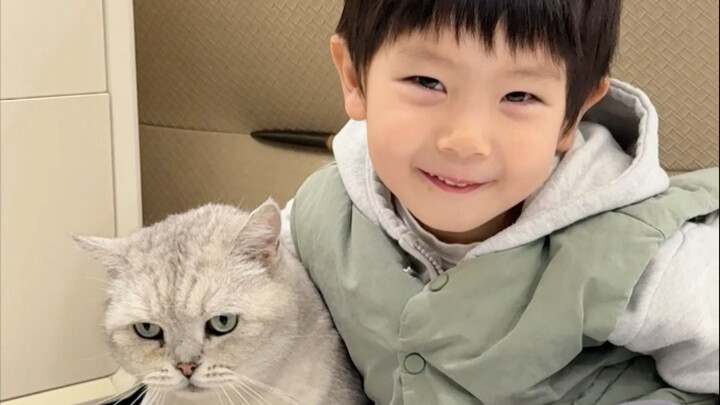 Flip to this video—these two brothers are so cute together!