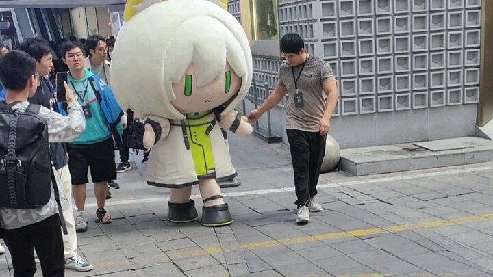 Helping an old lady cross the road