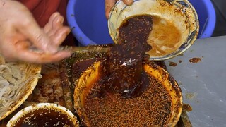 I'm back in Xi'an to eat the "washing-up" liangpi again.