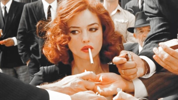 “她等着一个人帮她拿下烟，众人却为她点起了烟”丨《西西里的美丽传说》