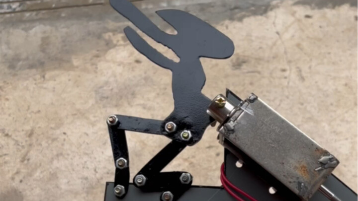 The steel version of the electric-shaking mocking pistol is here